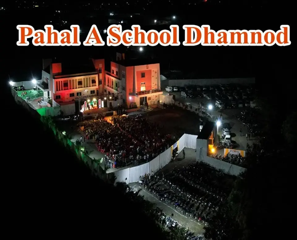 The campus lit up at night during Koshish
